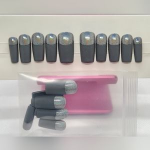 Matte gray with silver iridescent chrome on upper part of Nail. Press On Nails